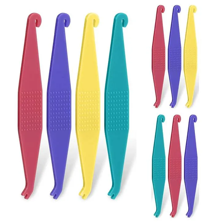 Instruments pour mise en place des élastiques